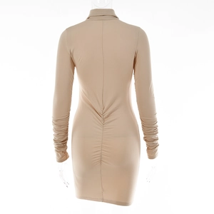 Detail view of khaki bodycon dress with ruching design on the back and sleeve cuffs
