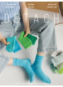 Detailed texture of vertical ribbed knit cotton blend crew socks in candy color shades