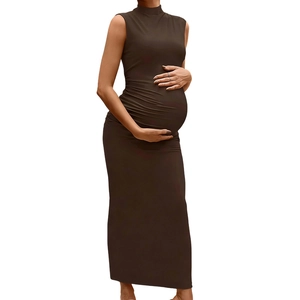 Detail of the elegant dark brown sleeveless high-neck maternity dress with side ruching