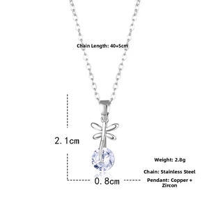 Detailed view of dragonfly pendant with dimensions showing 2.1cm length and zircon stone