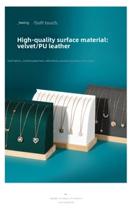 Detail view of arched necklace display stands with solid wood base in velvet and PU leather
