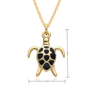 Detailed view of turtle pendant with dimensions 16mm by 20mm and black enamel shell