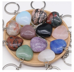 Detailed collection of assorted heart-shaped natural crystal and agate stone keychains
