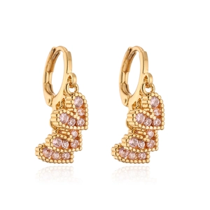 Detail of 18K gold-plated earrings with three-tier stacked pink zircon hearts