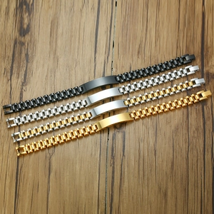 Detailed shot of titanium steel id bracelets in black, silver, and gold on wood surface
