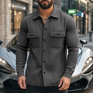 Close-up of a dark grey fleece shacket with lapel collar and chest pockets for men
