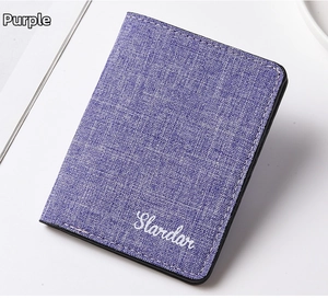 Close-up of purple canvas wallet showing durable linen texture and Slardar branding