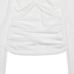 Detailed view of the pleated hem on a white sheer mesh off-the-shoulder top for women