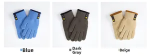 Detailed close-up of thick knitted winter gloves with smiley face patch in three colors