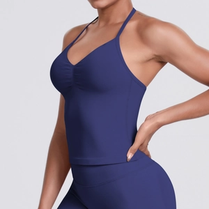 Detail of dark blue seamless yoga set with thin strap V-neck top and high waist leggings