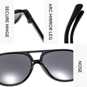 Detail view of secure hinges, arc mirror legs, and nose pads on black pilot sunglasses
