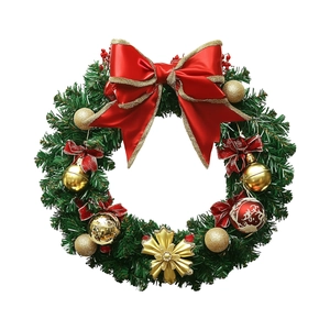Christmas wreath with green pine needles, red satin bow, and festive gold ornaments