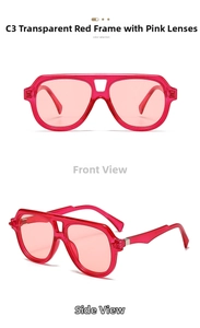 Close-up of double bridge aviator sunglasses with transparent red frames and pink lenses
