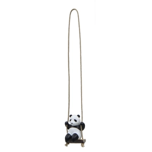 Detail of creative resin panda swinging on a branch decorative hanging ornament