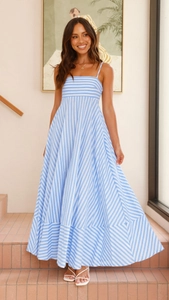 Detail of blue and white striped maxi dress showing the A-line hem and loose fit design