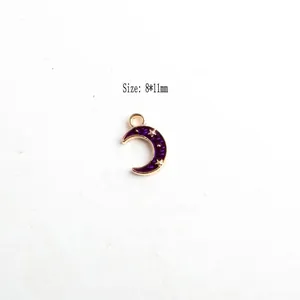 Detail of 8x11mm purple crescent moon enamel charm with gold star and top hanging loop