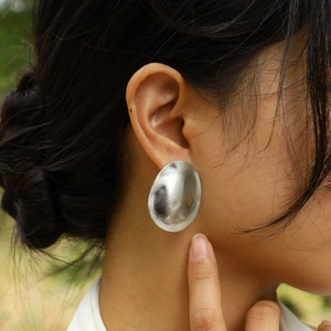 Chic oval matte silver stainless steel stud earrings with brushed metallic finish
