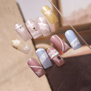 3D embossed butterfly nail stickers with lace patterns and pearls in soft pastel colors