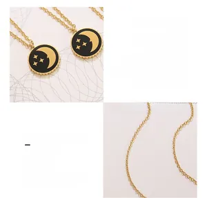 Detailed macro view of celestial star and moon pendant in 18k gold plated titanium steel