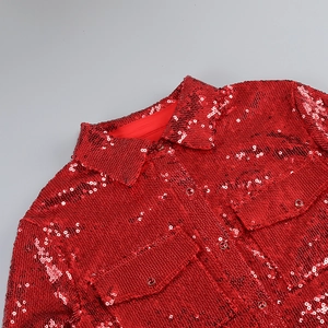 Detailed view of red sequin shirt featuring lapel collar and flap chest pockets