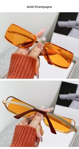Detail view of gold steampunk sunglasses with hollow temples and champagne lenses
