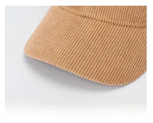 Macro shot of thickened corduroy baseball cap brim with vertical ribbed texture detail