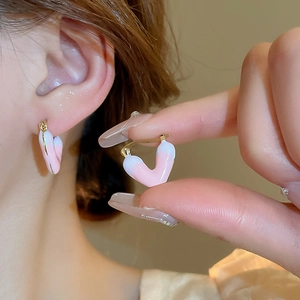 Minimalist small pink and white enamel heart hoop earrings with golden finish for women