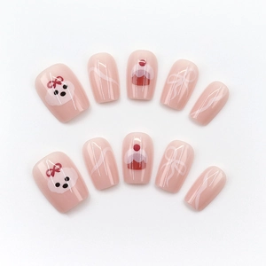 Unghie finte rosa con cani cartoon, cupcake alla ciliegia e fiocchi bianchi eleganti