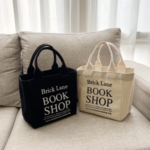 Versatile canvas tote bag in black and beige with Brick Lane Bookshop print design