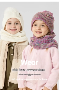Detail of warm winter knit hat and scarf set with pompom for kids showing cozy texture