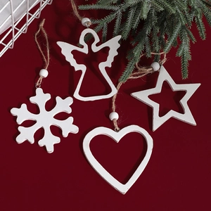 White wooden Christmas ornaments set with snowflake heart and angel on red background