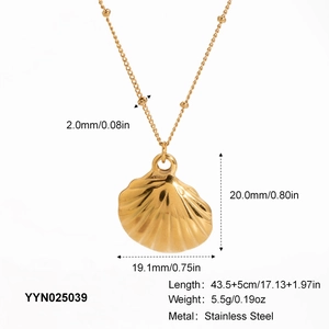 Detail view of golden stainless steel shell necklace with precise size and weight metrics
