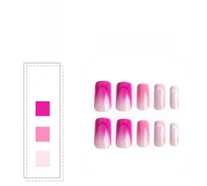 Detail view of long square pink gradient press-on nails with white French tips and lines