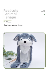 Detail of plush husky hat showing soft faux fur texture and movable ear airbag paws