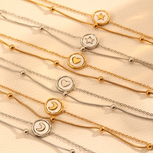 Double-layer snake chain bracelets with heart and moon pendants in gold and silver finish