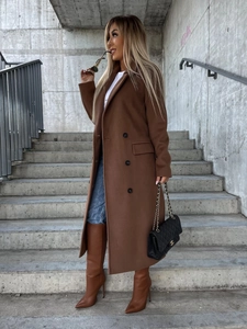 Close-up of brown double-breasted wool coat with lapel collar and side pockets