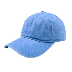Detail of light blue washed denim baseball cap with vintage distressed texture and stitching