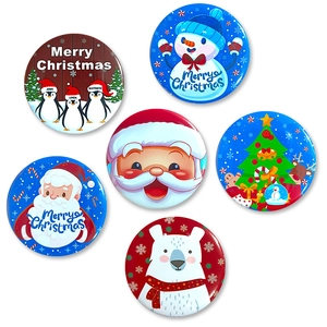 Set of 6 Christmas tinplate badges featuring Santa, snowman, and penguin for festive parties