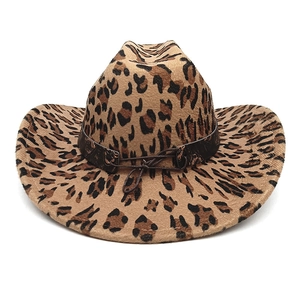 Detail of leopard print western cowboy hat with brown leather band and wide brim