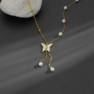 Elegant gold butterfly necklace with pearl tassels and green gemstone pendant for women