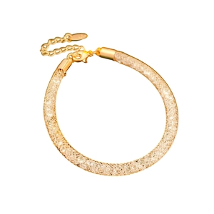 Elegant gold mesh tube bracelet filled with sparkling clear crystals and lobster clasp