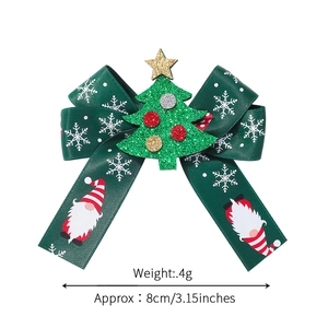 Christmas bow hair clip with snowflake pattern and green sequined Christmas tree decor