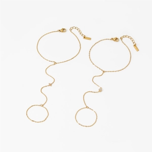 Elegant gold stainless steel finger bracelet with star charm and sparkling zircon stone