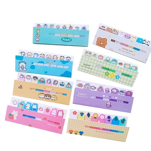 Assorted colorful cute cartoon sticky note pads and memo tabs set on white background