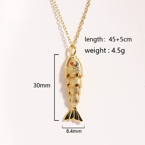 Detail view of a gold koi fish pendant showing precise dimensions and textured scales