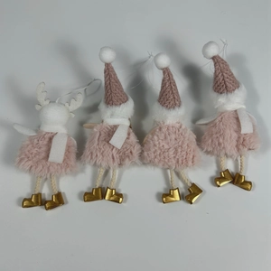 Detail of four handmade Christmas plush pendants featuring pink knit hats and a reindeer