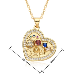 Detail view of heart pendant showing 20mm by 18mm size with multi-color gemstones