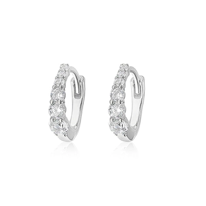 Close-up of silver S925 huggie earrings with five brilliant-cut diamonds and hinge detail
