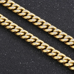 Two-tone gold and silver Cuban link titanium steel necklace with a polished finish