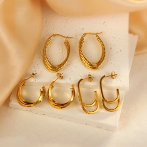 Three pairs of elegant gold plated stainless steel hoop earrings in diverse sizes and shapes